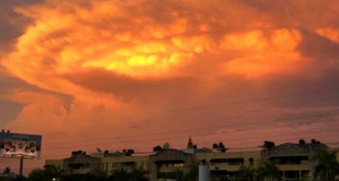 IMPRESIONANTE NUBE COLOR NARANJA Y AMARILLO SE FORMÓ SOBRE SANTO DOMINGO