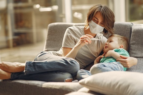 https://www.pexels.com/photo/mother-checking-his-son-temperature-3985216/