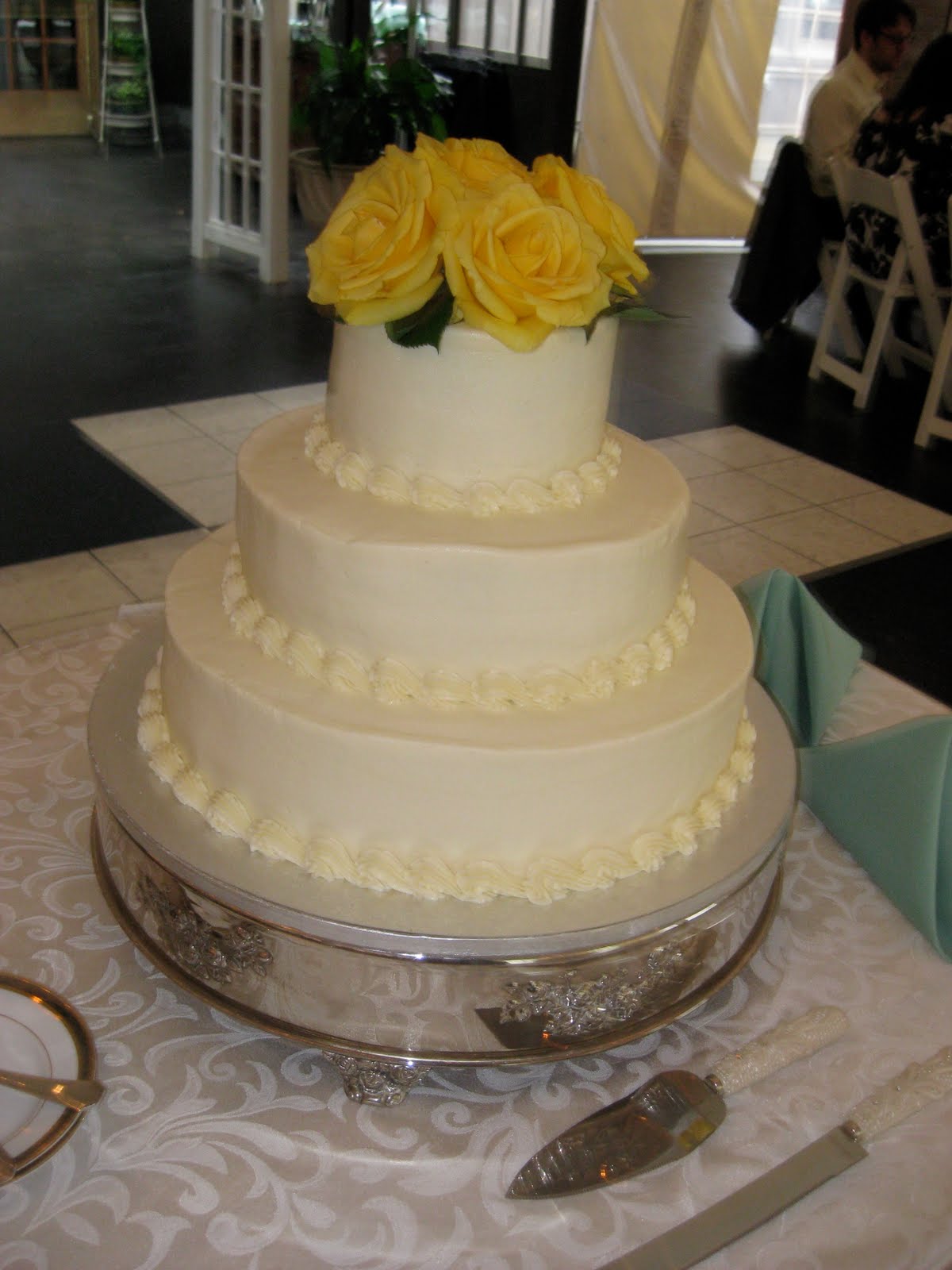 spring wedding cake ideas Simple Elegance with yellow roses.