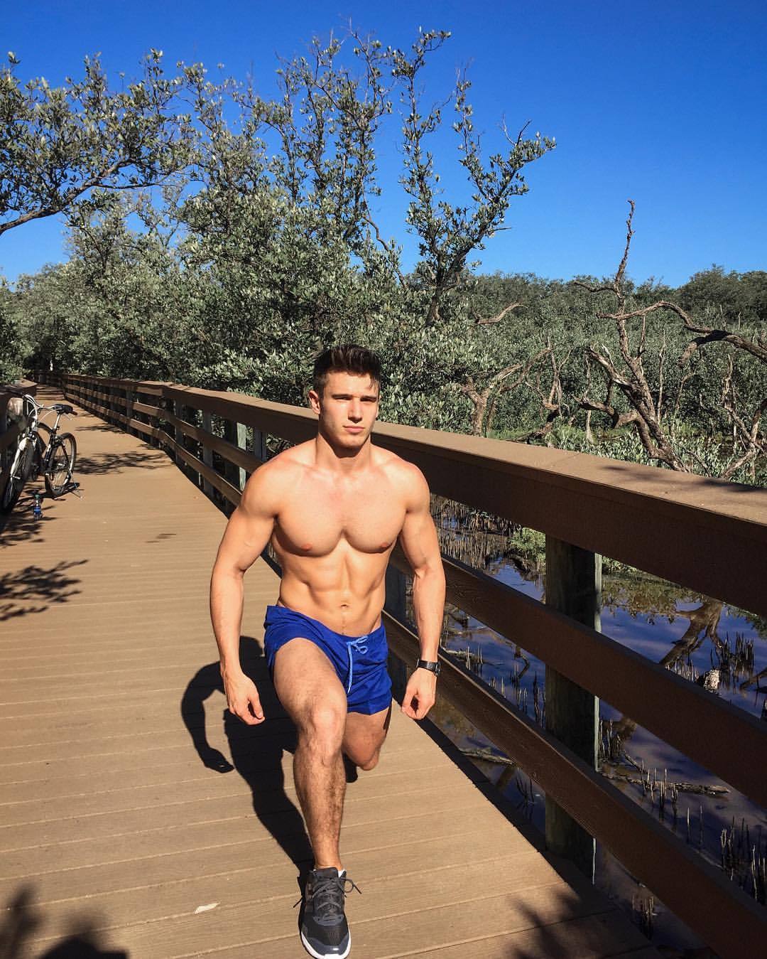 handsome-fit-shirtless-gay-guy-pecs-outdoor-park-workout