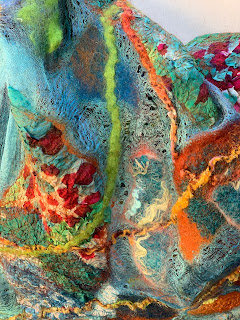 Margilan silk felted with prefelt pieces made with wool and hand painted silks.