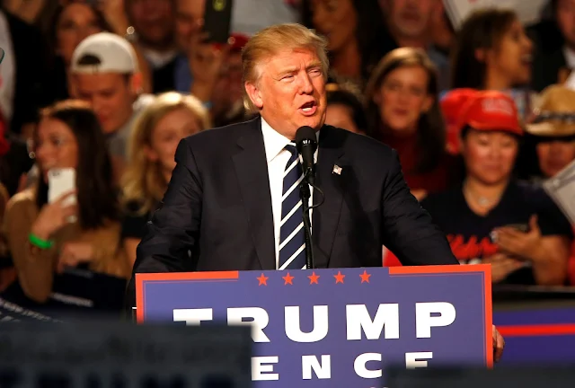 Image Attribute: U.S. Republican presidential nominee Donald Trump speaks at his final campaign event at the Devos Place in Grand Rapids, Michigan, U.S. November 8, 2016.  REUTERS/Rebecca Cook