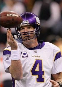 Brett Favre last season on the field at an away Vikings Game spinning the ball