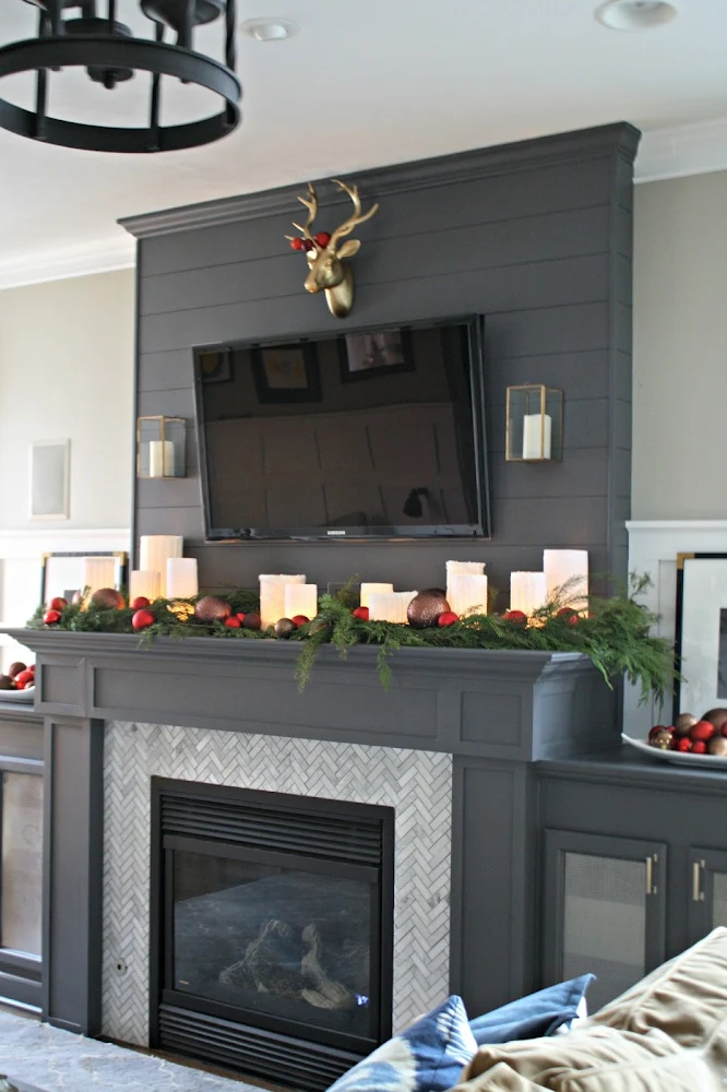 gray fireplace herringbone tile