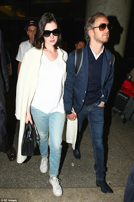 Anne Hathaway Reveals Baby Bump, Her First Child With Husband Adam Shulman