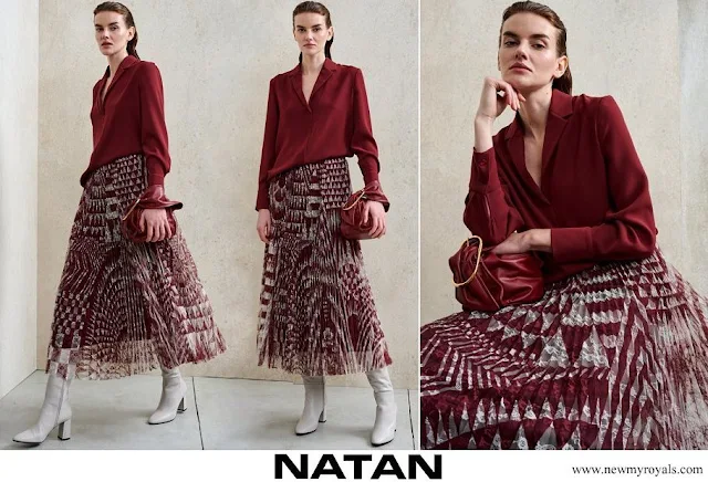 Queen Mathilde wore Natan burgundy top and printed skirt