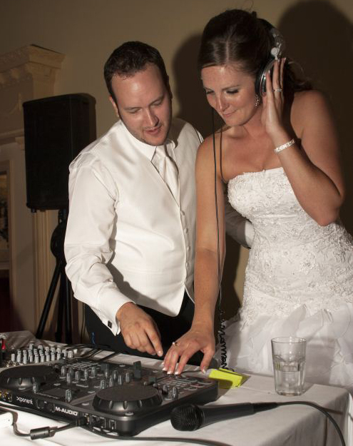 Wedding DJ DJ Absolute gets some help from the bride and groom