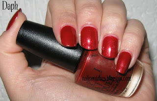 opi vould you like a lick-tenstein red nail polish shimmer gold nailswatches