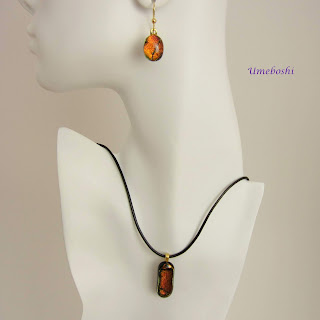 https://umeboshi.indiemade.com/product/amber-memories-dichroic-fused-glass-pendant-and-earrings-jewelry-set-one-kind