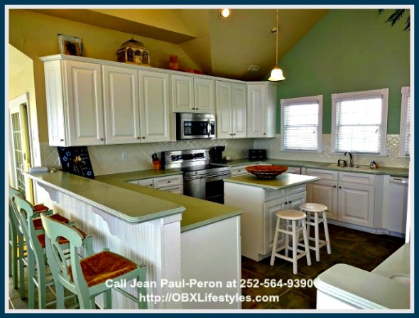 This 9 bedroom Outer Banks NC home for sale also has plenty of cabinets and shelves for all your kitchen storage needs.