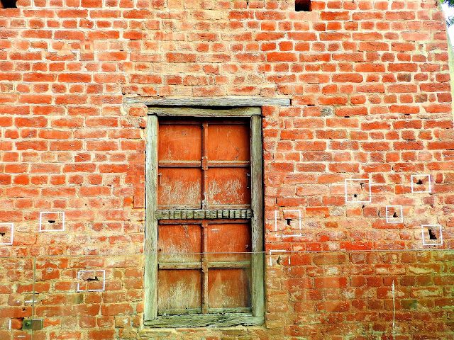 Bullet holes in the wall dating back to 1909 | Jallianwalla Baug massacre | Amritsar, Punjab (April 2016)