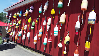 Bouy fishermen memorial wall at Carrier's Mainely Lobster in Buckport, Maine