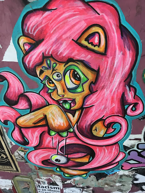 pink character freeman alley nyc