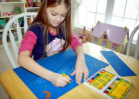 Using a picture of van Gogh's "Starry Night" as a guide, Tessa drew the majority of her interpretation with oil pastels.