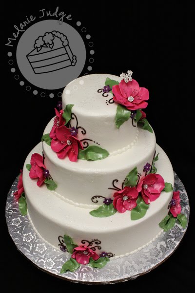 buttercream wedding cake gum paste flowers with rhinestones pink purple