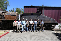 Tender tank project volunteers and staff pose with the new tank on the tender frame.