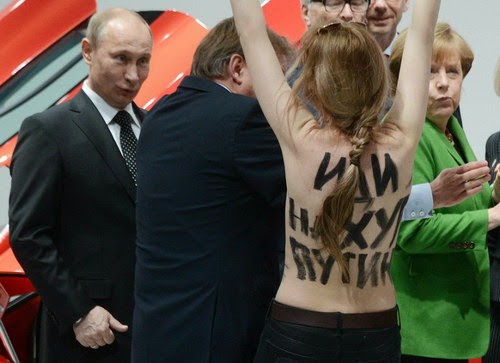 http://www.funphotovideo.com/femen-putin-attacked-in-germany-photo-and-video/