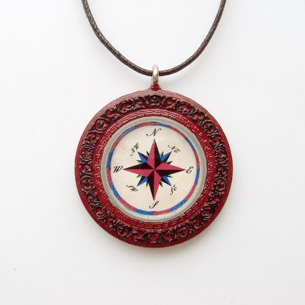 In the center of the pendant is a print of my digital drawing of a Nautical