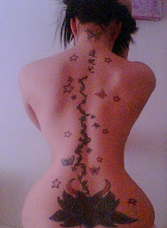 tribal back tattoo girl