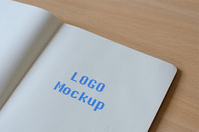 Hand note book logo psd mockup with real texture