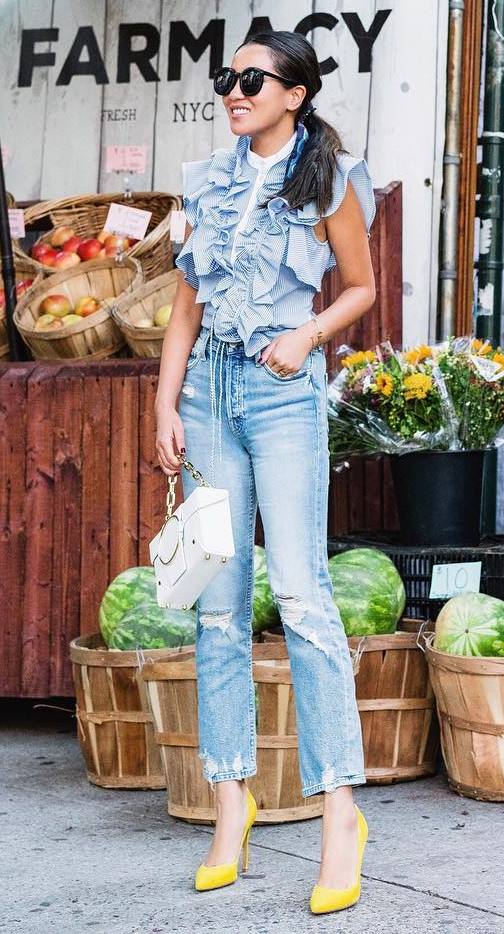 how to style a pair of yellow heels : ripped jeans + bag + ruffle blouse