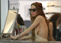 Lindsay Lohan’s Breasts Give Their Own Peepshow