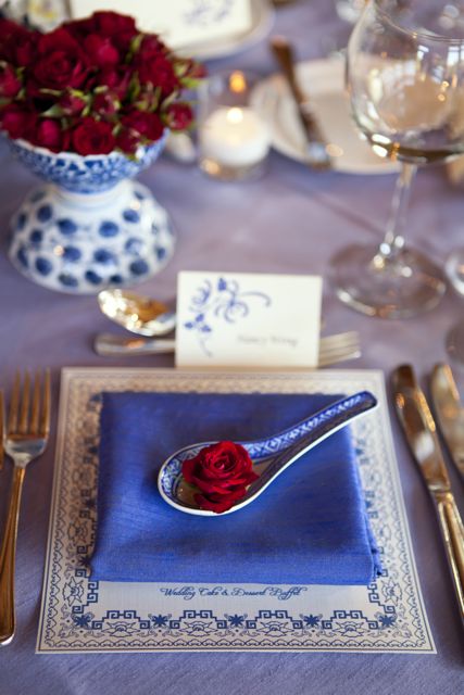 The striking place setting for each guest honored the Chinese traditions of