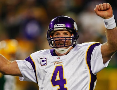 brett favre vikings celebrating. Quarterback Brett Favre #4 of