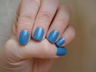 nail of the day blue sparkly polish
