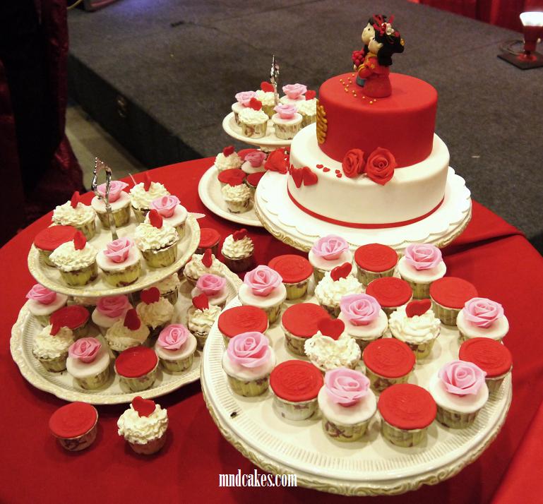 The cake was 2tiered 6 9 with a pair of Chinese wedding couple as 