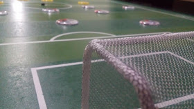 Futebol de mesa.