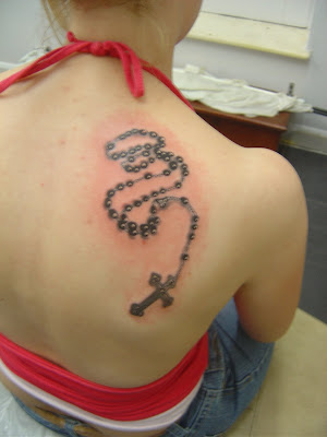 cross tattoo for girls. Cool Cross Tattoo.