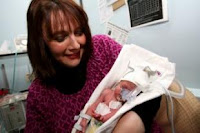 Simone Katz, 43y, with baby Beau last year. He was born three months premature.