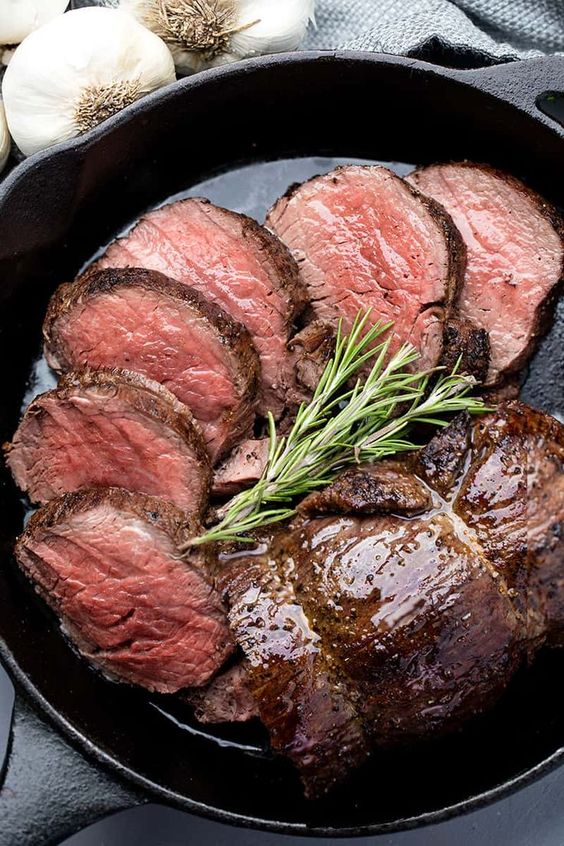 Make melt-in-your-mouth roasted beef tenderloin with a simple garlic brown butter sauce. This simple recipe is a show stopper!