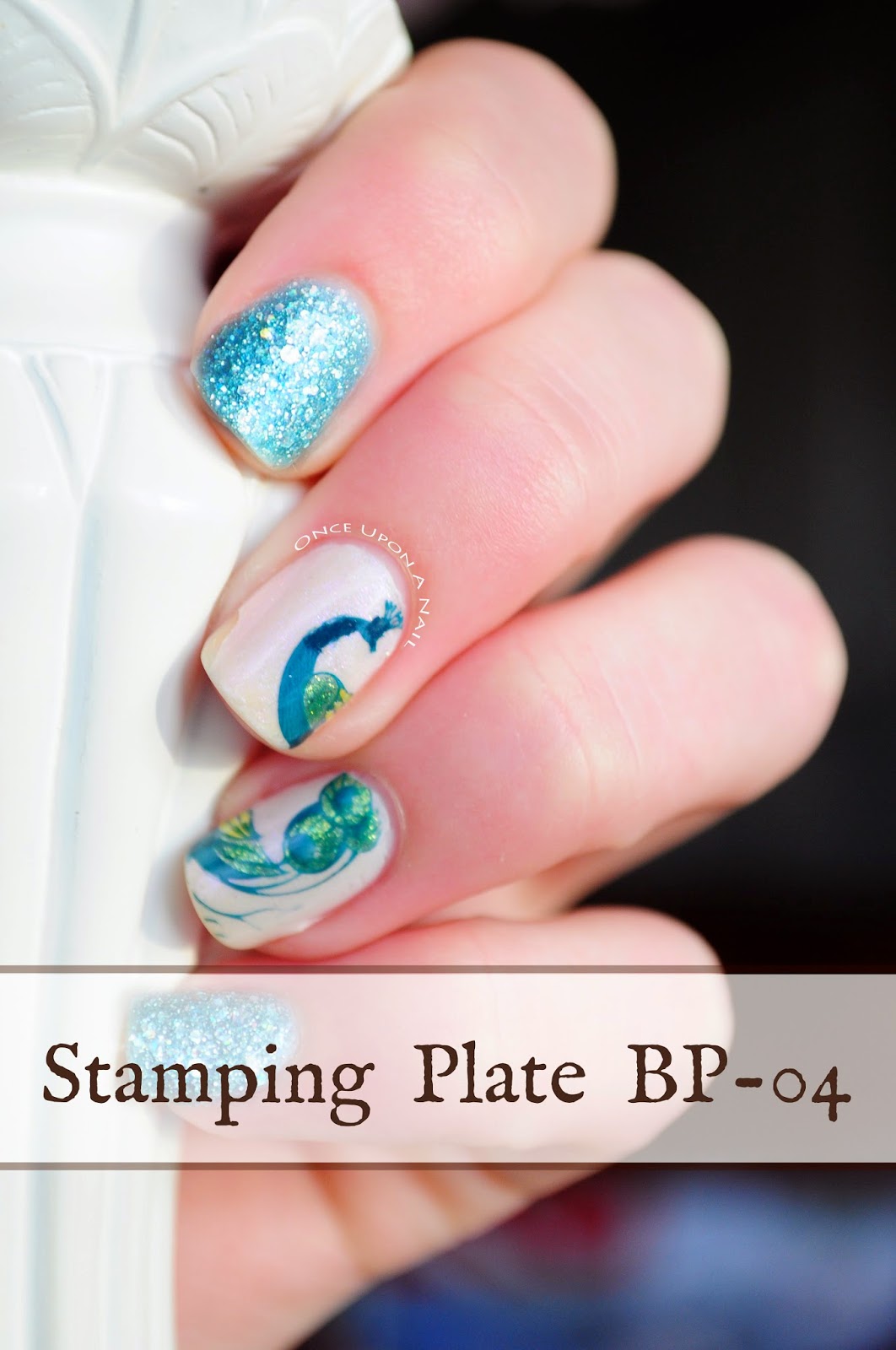 http://onceuponnails.blogspot.com/2015/01/peacock-stamp-review.html