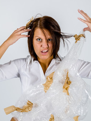 frustrated woman with packing tape attached to her greasy hair.jpeg