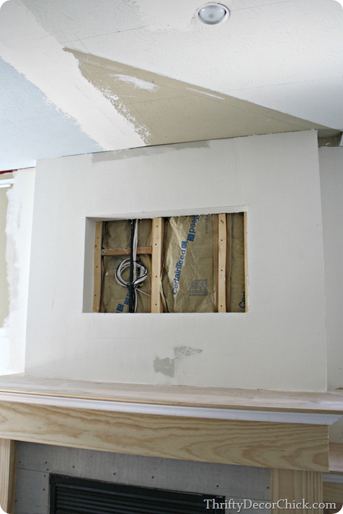 wall above fireplace for TV