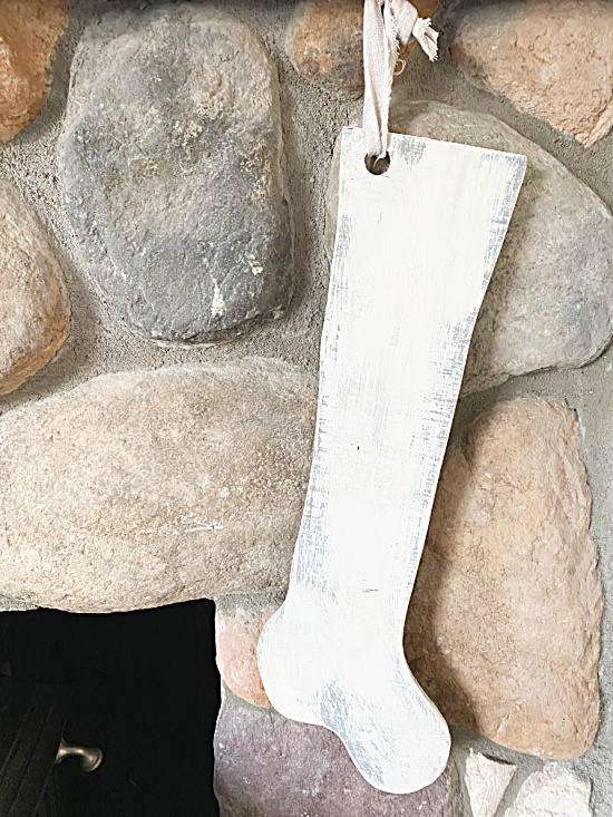 wooden stocking on stone fireplace