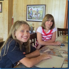 BFFs back together again after a month, planning their "store." 