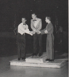 Men's podium at the 1956 World Figure Skating Championships in Garmisch-Partenkirchen, Germany