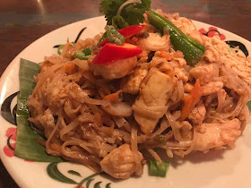 chicken pad thai on a plate