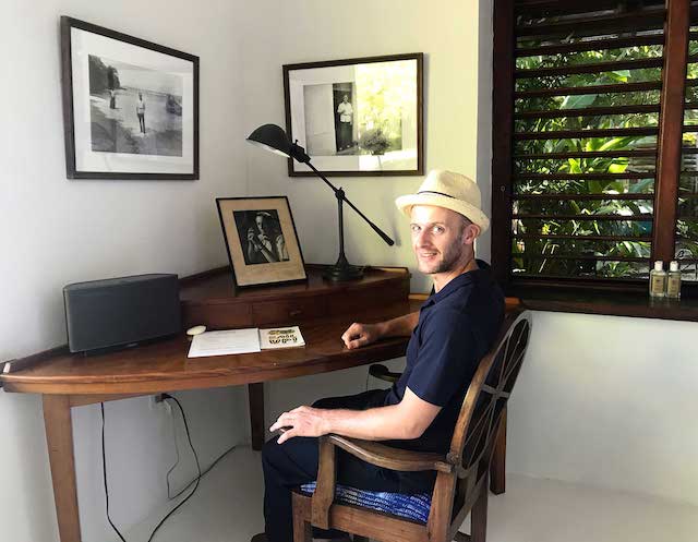 Sitting at Ian Fleming's desk