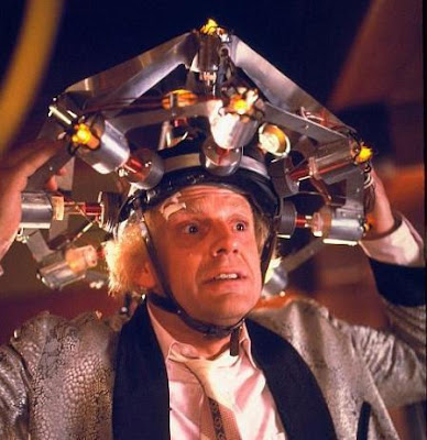 Emmet Brown is wearing a HeadLight, the latest in personal illumination appliances