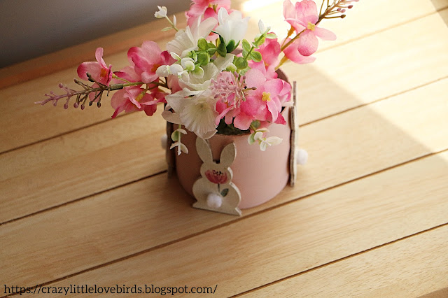 flowers displayed in upcycled tissue tube holder