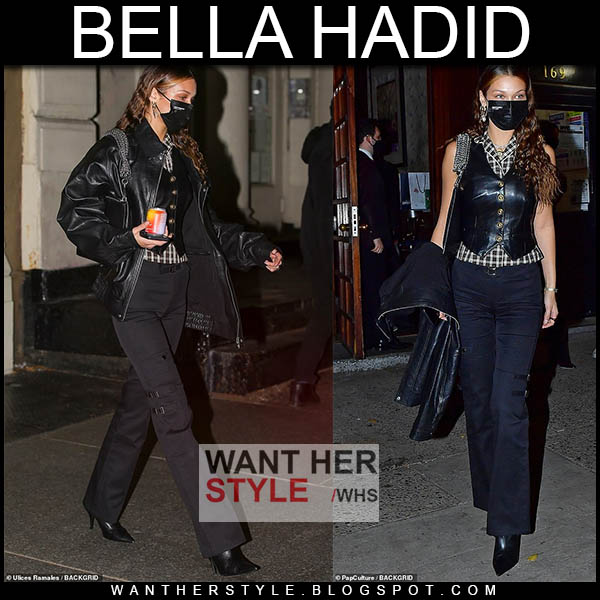 Bella Hadid in black leather jacket, black vest and black boots