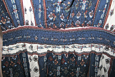 http://www.shein.com/Navy-Split-Tie-Waist-Vintage-Print-Maxi-Dress-p-265045-cat-1727.html