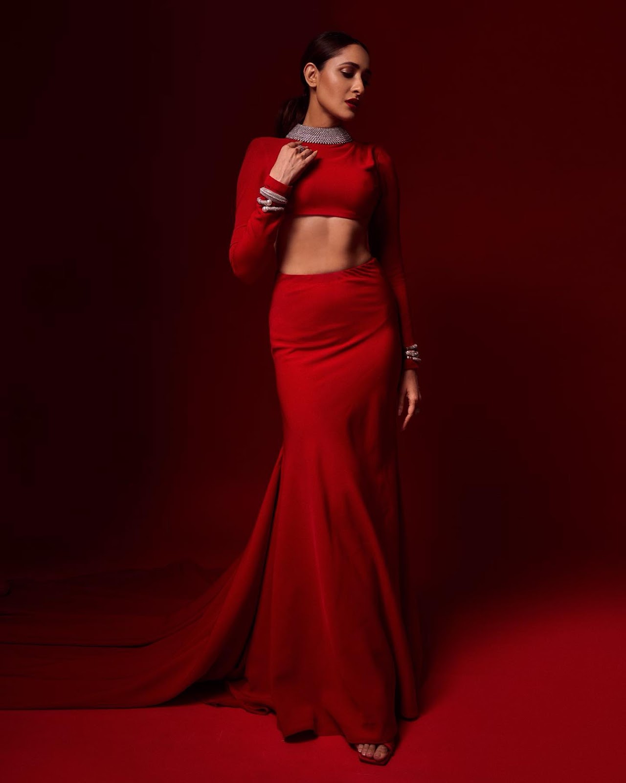 Pragya Jaiswal sexy midriff red outfit hot actress