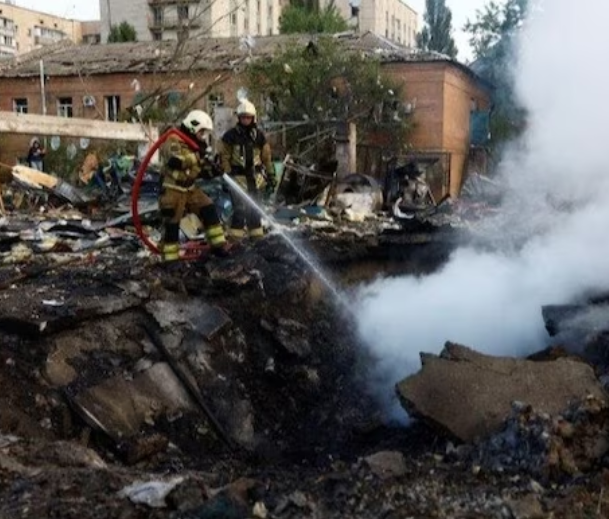 Blasts heard in Kiev after air raid warnings; rescue personnel on the scene