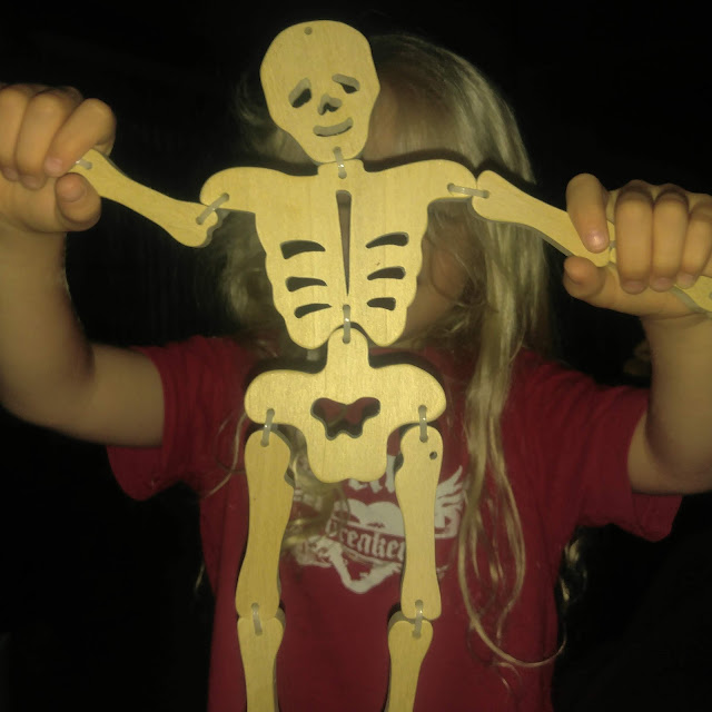 Handmade Halloween Skeleton Craft Kit Grandson Showing off His Skeleton