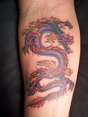 Tribal dragon tattoos arms Tribal dragon tattoos on arms